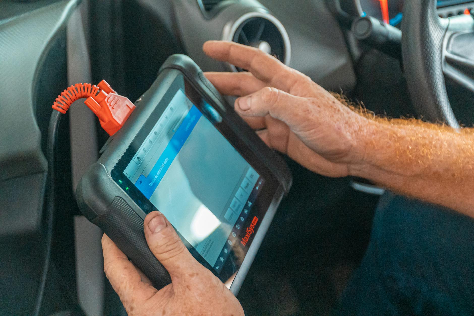 close up of mechanic with tablet