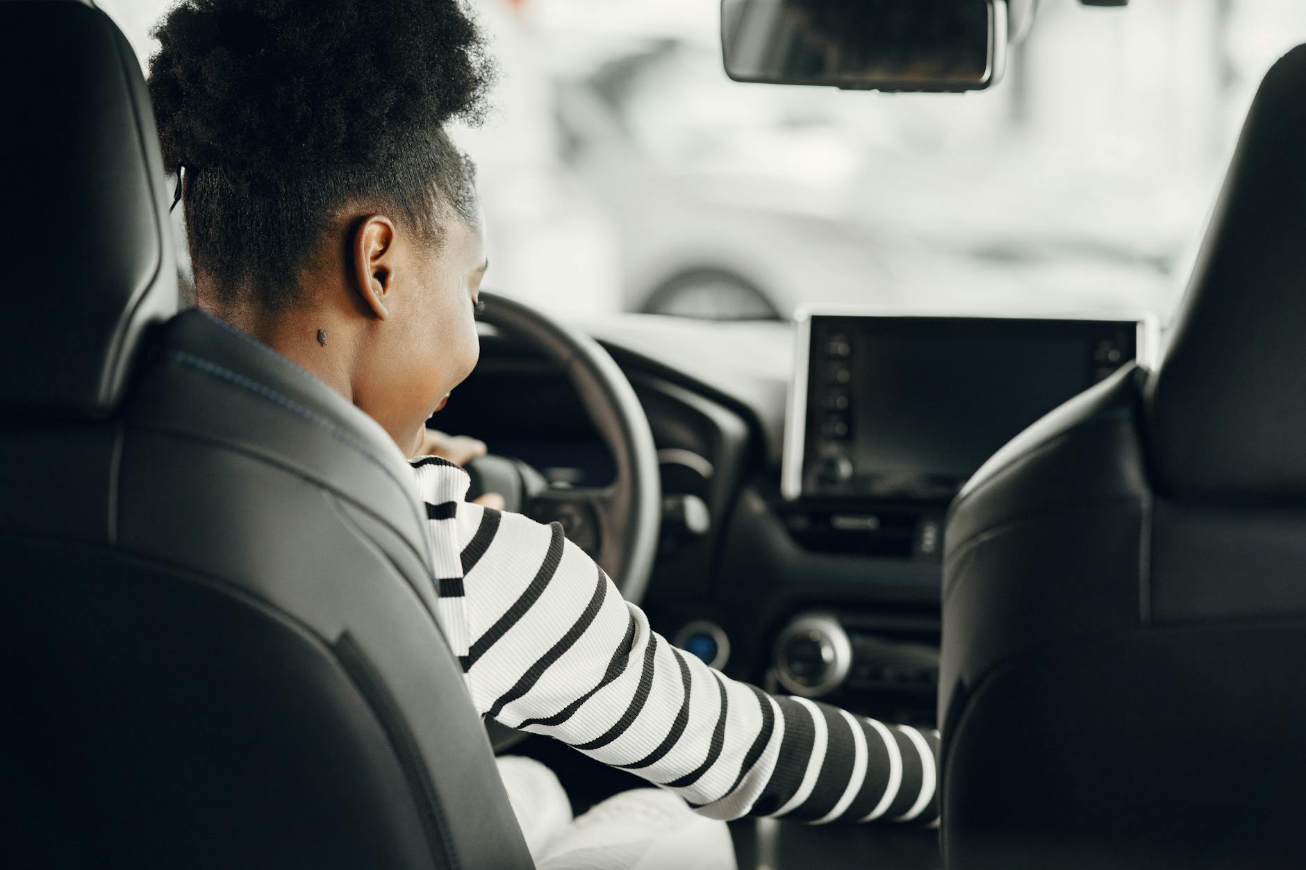 girl sitting in a car